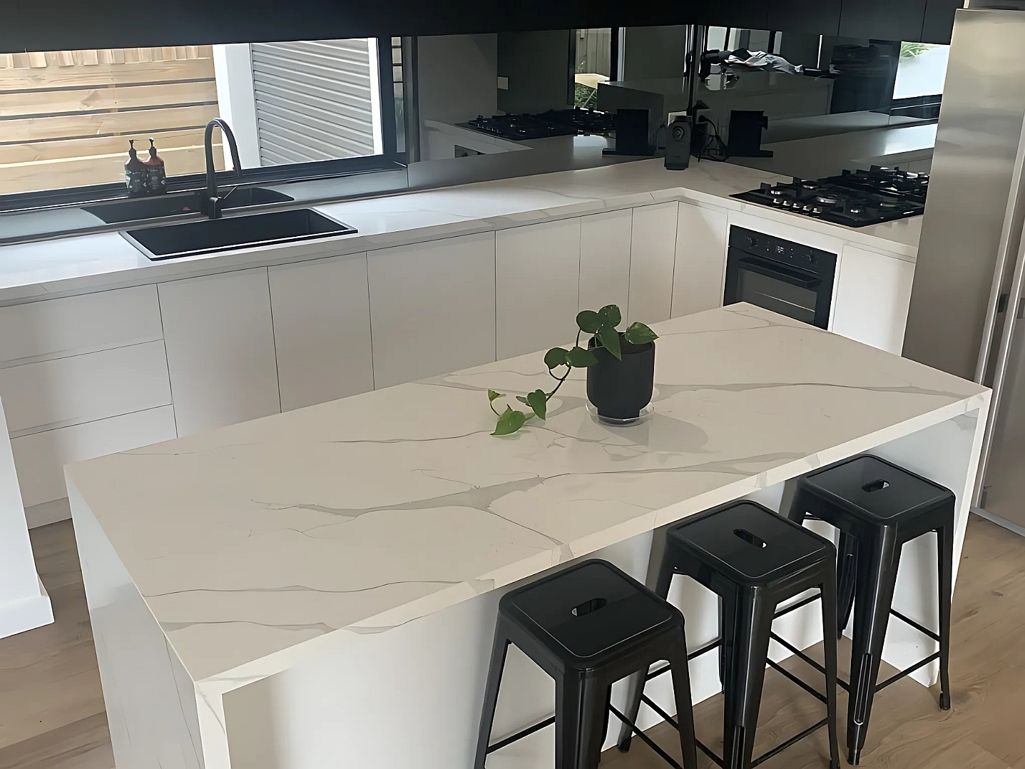 Kitchen island with stone benchtop